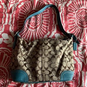 Teal coach purse